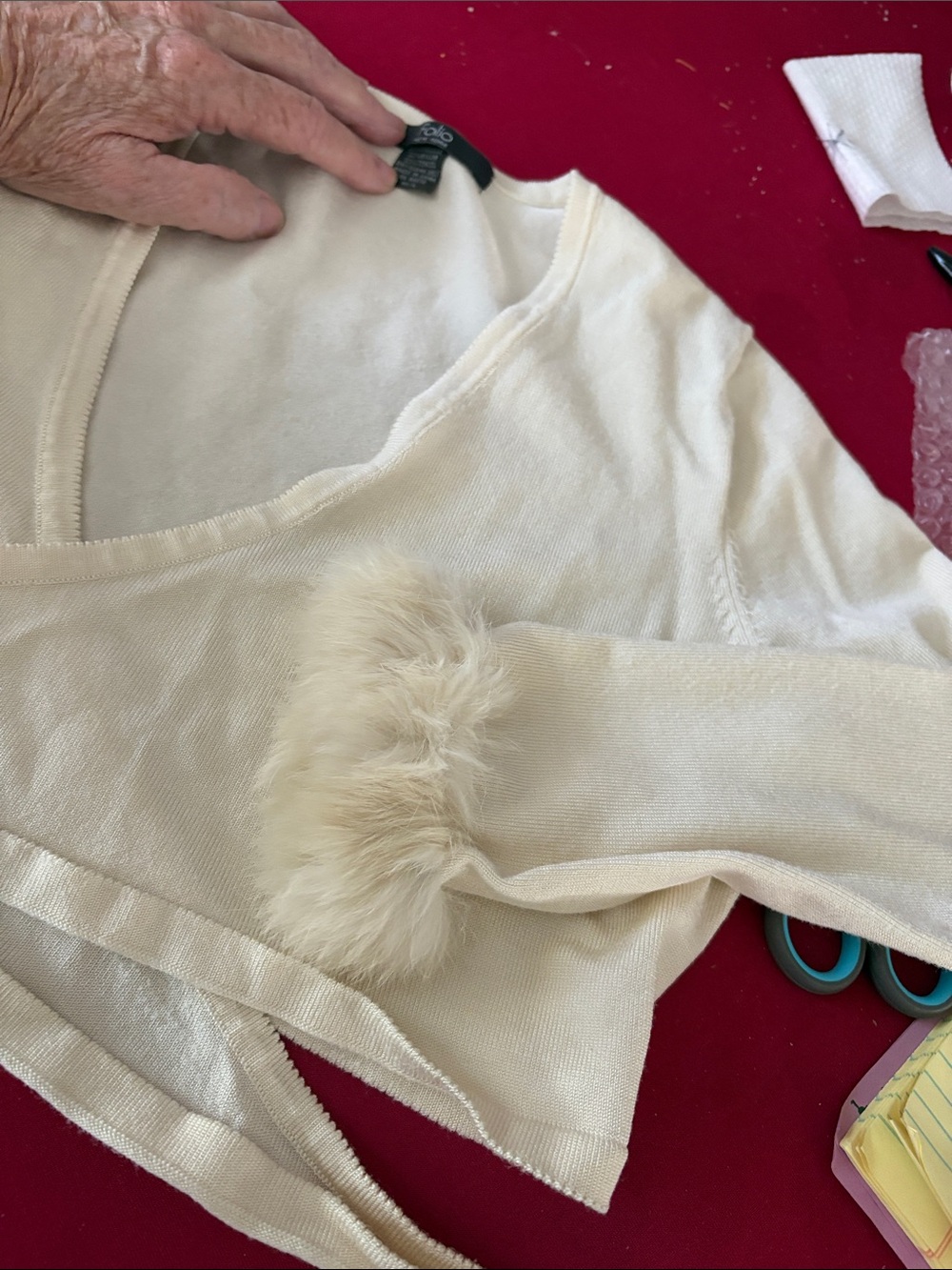 Women's V-Neck Sweater with Faux-Fur Cuff in Cream Folio New York wrap cardigan